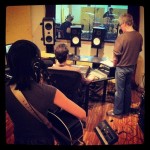 Leslie Hunt recording acoustic guitar